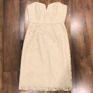 Strapless lace occasion dress.